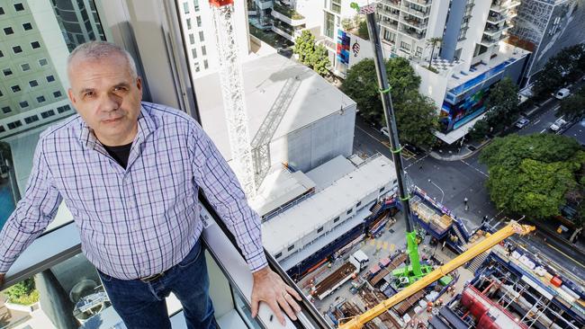 Festival Towers resident Marco Diotallevi has made several complaints about the Cross River Rail construction happening outside his window on Albert street in Brisbane city. Picture Lachie Millard