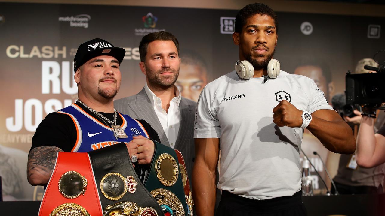 Eddie Hearn stands between Andy Ruiz Jr and Anthony Joshua at a press conference before their rematch. (Photo by Richard Heathcote/Getty Images)