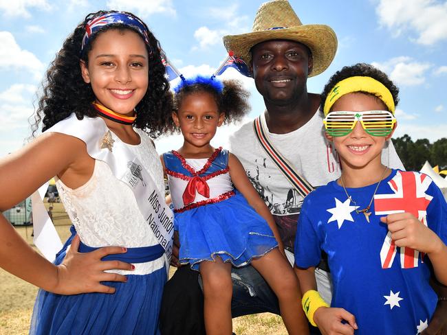 Destiny Lyons, 11, Aliza Lyons, 4, Alieu Lyons and Jeziah Lyons, 7, celebrating Australia Day at Woodward Park, Liverpool, last year. Picture: Joel Carrett