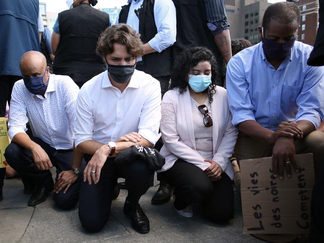 Canadian Prime Minister Justin Trudeau takes a knee during in a Black Lives Matter protest on Parliament Hill in Ottawa, Canada. Picture: AFP