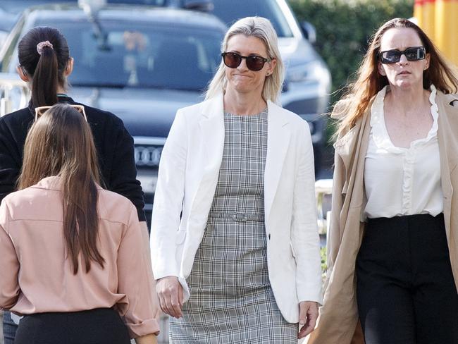 Police officer Amy Scott (centre) arrives at the Lidcombe Coroners Court for the coronial inquest into the death of six people who were stabbed by Joel Cauchi. Picture: NewsWire / Nikki Short