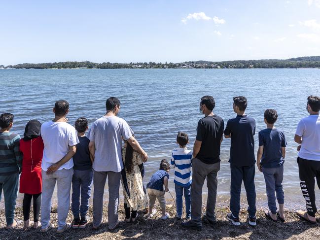 Former Afghan interpreters who worked alongside the ADF with their children in NSW. Picture: Owen Hammond/APAC Sport Media