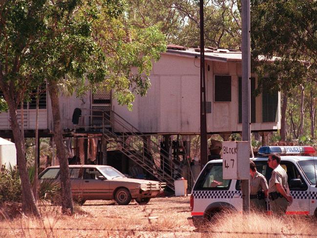 Police guard a home near the Stuart Highway where two men were wounded before Rod Ansell shot dead Sergeant Glen Huitson. Picture: Clive Hyde