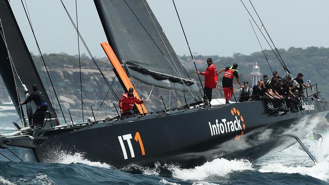 Christian Beck and his InfoTrack leads the fleet out of Sydney Harbour during the start of the 2019 Sydney to Hobart. Pic: Brett Costello