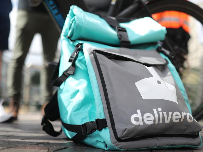 SYDNEY, AUSTRALIA - NewsWire Photos MARCH 26, 2021 - Food delivery riders protest against 'wage theft' and work conditions by Deliveroo outside the Museum of Contemporary Art in Sydney.Picture: NCA NewsWire / Christian Gilles