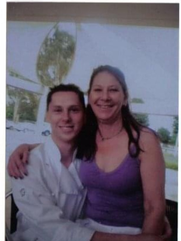 Then. Jason Saxby with his mother. Picture: Supplied