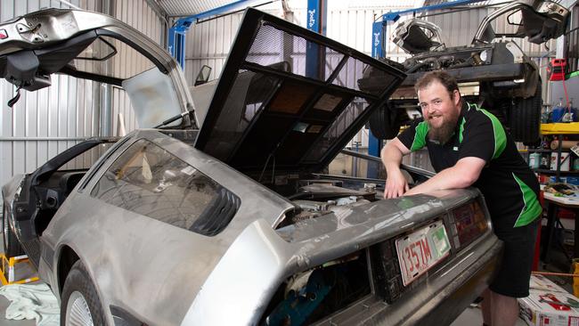 Owner Paul Black said DeLorean Dynamics will bounce back after a semi-trailer tore through the workshop. Picture: Brett Hartwig