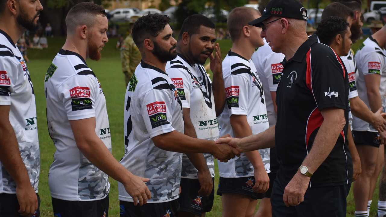 Governor General David Hurley shakes hands with the Bellingen Dorrigo Magpies prior to kick off against the Australian Army Thunder in the Sgt. Matthew Locke Memorial match at Bellingen. Picture: Matt Deans