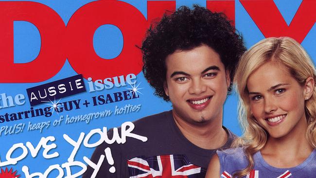 Dolly magazine has been around for a long time. As evidenced by Guy Sebastian’s hair in this picture with Isabel Lucas. (Pic: Supplied)