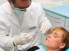 Pretty young girl at the dentist MUST CREDIT THINKSTOCK