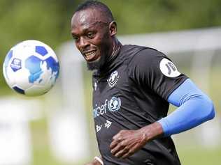 CHARITY MATCH: Rest of the World player Usain Bolt takes part in a training session ahead of the Soccer Aid for UNICEF match earlier this year. Picture: Henry Browne