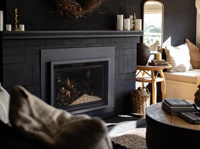 The gas fire in the lounge at The Binney keeps the Sandy Bay pad toasty and warm. Picture: Dearna Bond