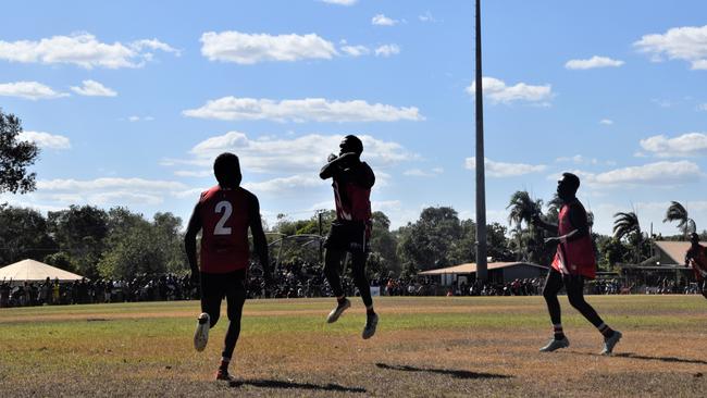 Thunder’s Adam Tipungwuti celebrates his set-shot goal after taking the mark of the day in the Tiwi Island Football League grand final between Tuyu Buffaloes and Pumarali Thunder. Picture: Max Hatzoglou