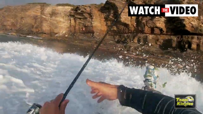 Rock fisherman gets hit by freak wave