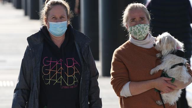 Masks are still mandatory in regional areas like Geelong. Picture: Alan Barber