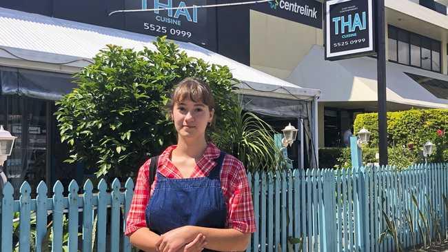 Tugun local Vivi Baker, 18, was one of the many hospitality staff laid off as a consequence of the government's coronavirus restrictions on restaurants. She is pictured here outside Currumbin Centrelink Photo: Jessica Lamb. Picture: Jessica Lamb