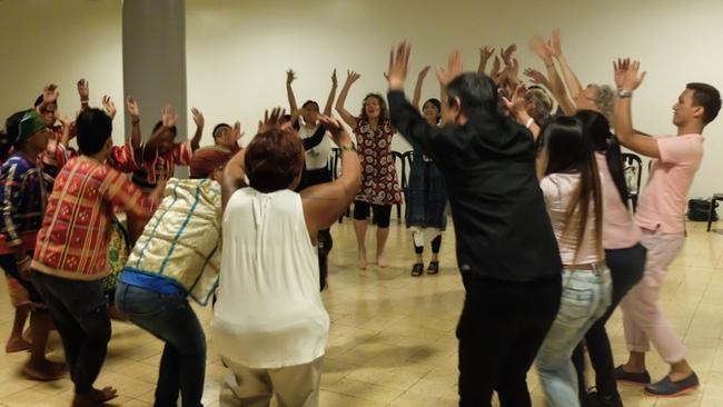 Delegates learn a dance at the Performance Curators Initiatives Symposium in the Philippines.