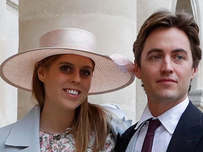 (FILES) In this file photo taken on October 19, 2019, Britain's Princess Beatrice and property tycoon Edoardo Mapelli Mozzi arrive to attend the wedding of prince Napoleon and Countess Olympia Arco-Zinneberg at the Saint-Louis-des-Invalides cathedral at the Invalides memorial complex in Paris. - Princess Beatrice, granddaughter of Queen Elizabeth II, will marry Italian businessman Edoardo Mapelli Mozzi on May 29 at Saint James Palace in London, Buckingham Palace announced on February 7, 2020. (Photo by FRANCOIS GUILLOT / AFP)