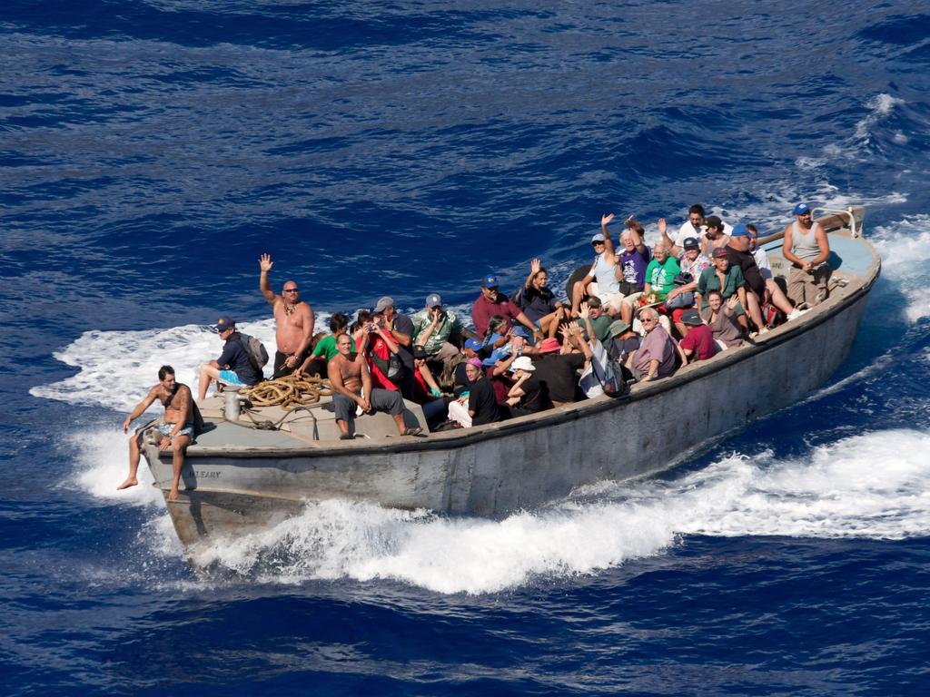 Islanders getting in supplies from the nearest settlement. Picture: Alamy