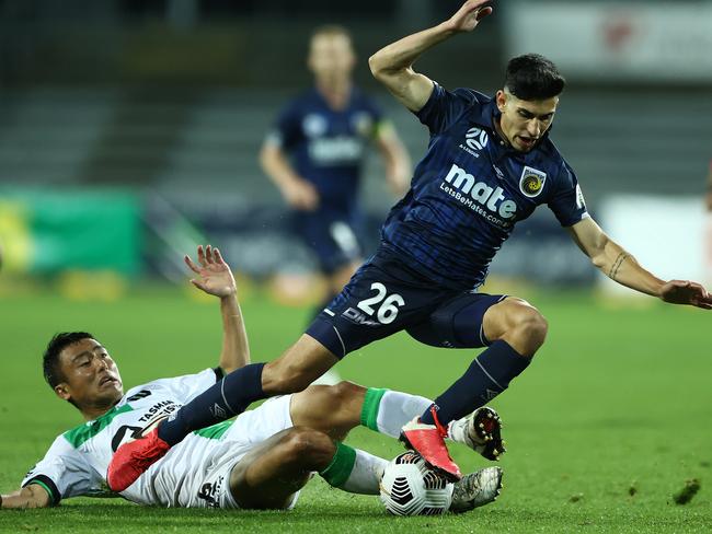 Western United’s Tomoki Imai tackels the Mariners’ Jaden Casella during a A-League match at UTAS Stadium last week. Picture: Robert Cianflone/Getty