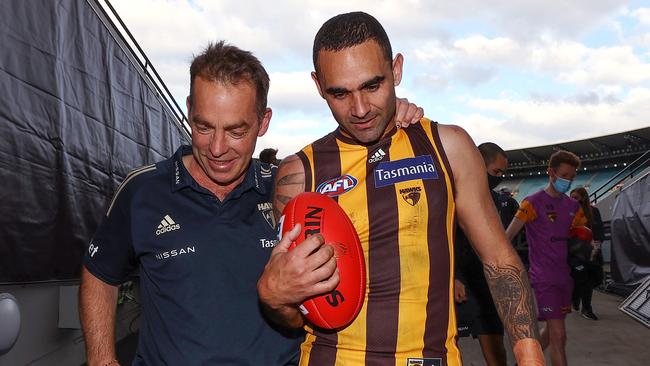 Alastair Clarkson, outgoing senior coach of Hawthorn and retiring star Shaun Burgoyne walk off the MCG together after the round 23 AFL match between the Richmond and Hawthorn at the MCG, on August 20, 2021, in Melbourne. Picture: Michael Klein