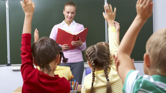 Generic image of teacher teaching students inside a classroom.