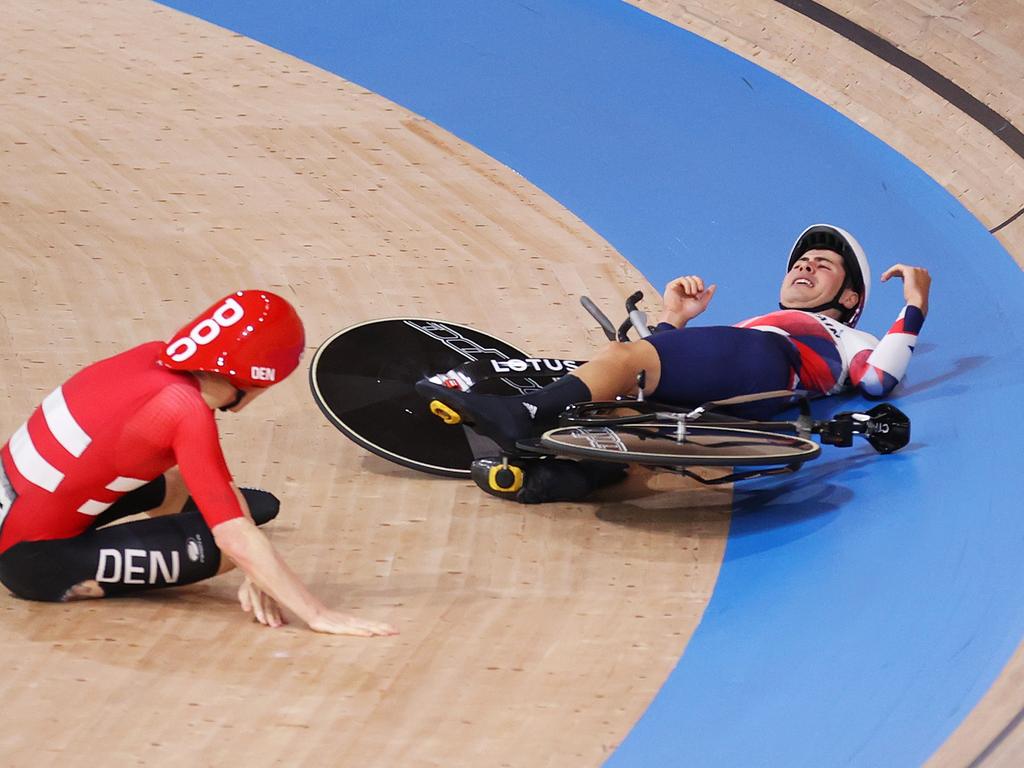 Frederik Madsen of Team Denmark and Charlie Tanfield of Team Great Britain on the ground after fall.