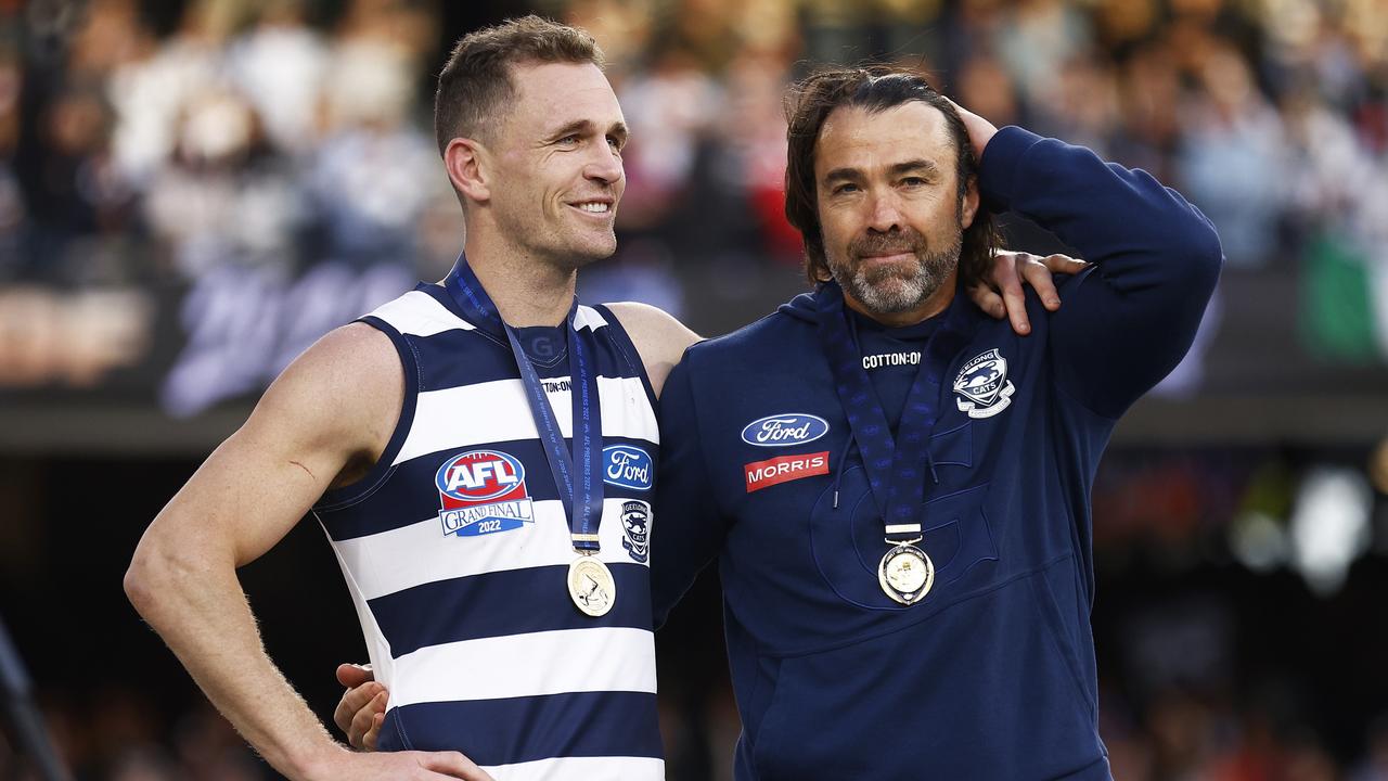 Cats captain and coach Joel Selwood and Chris Scott after the 2022 premiership win. Picture: Daniel Pockett