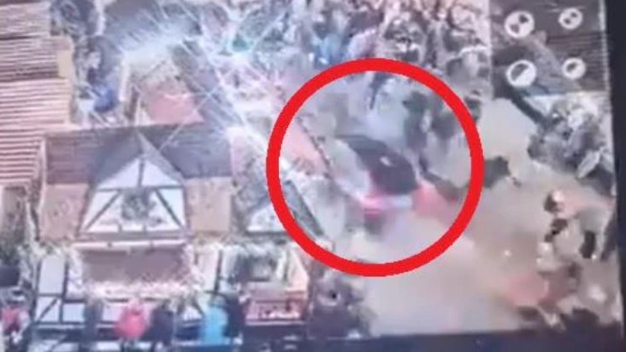 Horror footage shows a car ploughing 400m through the market.