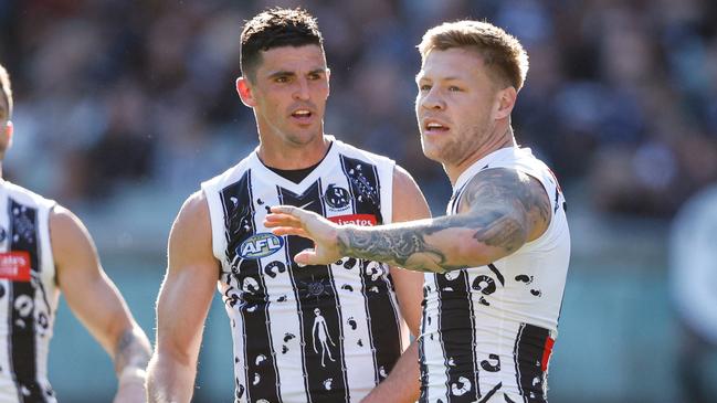 Scott Pendlebury and Jordan De Goey will both return for Collingwood against Gold Coast on Saturday. Picture: Dylan Burns / Getty Images