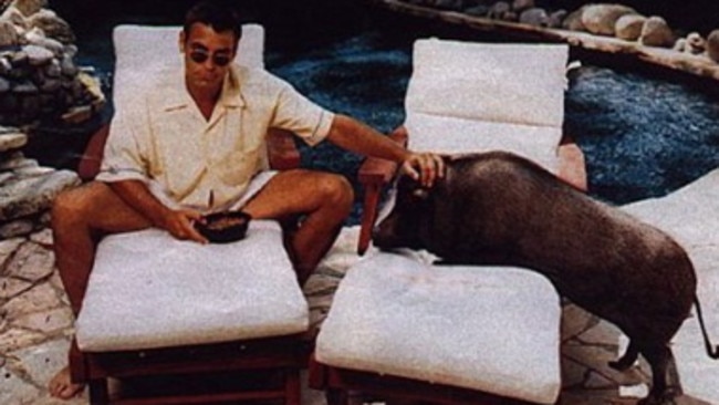 Actor George Clooney and his pet pig.