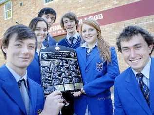 TOP TEAM: Trinity Catholic College students (from left) Thomas Whelan-Young, Julia Wilson-Bald, Nick Davis, Marley Berry-Pearce, Hannah Davis-Glencross and Torrington Callan with the Bond University Best on the Coast quiz competition shield. Picture: Jay Cronan