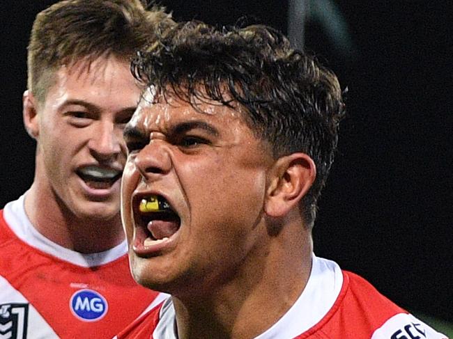 Latrell Mitchell of the Roosters celebrates after scoring a try during the Round 24 NRL match between the Sydney Roosters and the Penrith Panthers at the SCG in Sydney, Saturday, August 31, 2019. (AAP Image/Dan Himbrechts) NO ARCHIVING, EDITORIAL USE ONLY