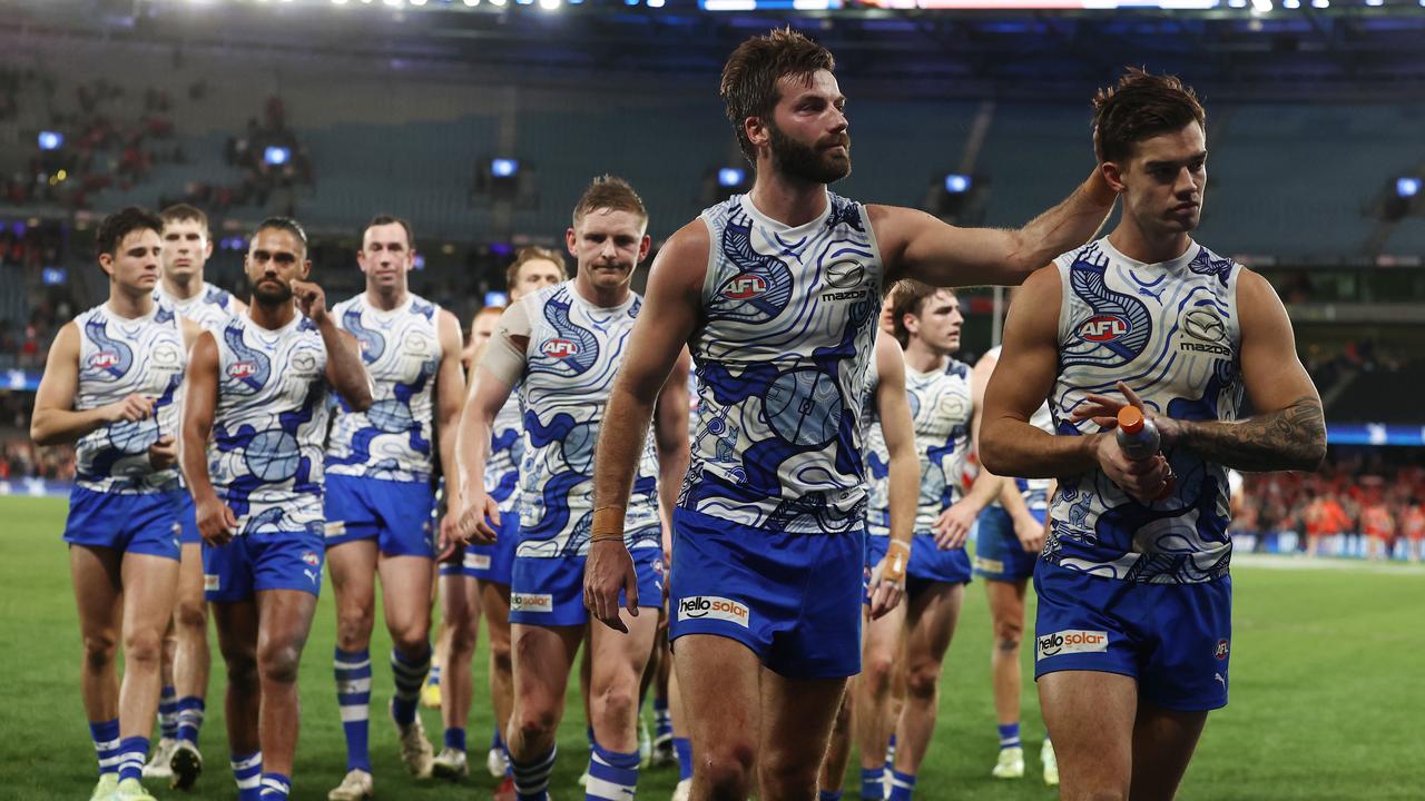 Dejected Roos players head off. Picture: Michael Klein