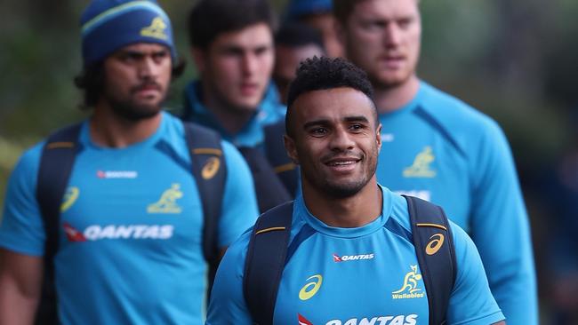 Will Genia walks towards a training session.