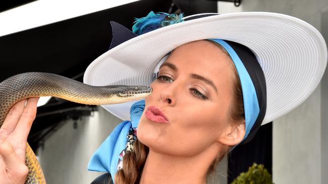 Robyn Lawley with Wanda the Water Python in the Kennedy Marquee. Picture: Jay Town