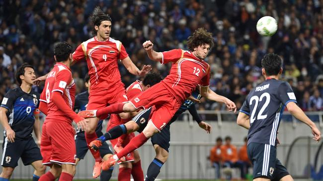 Despite the country being ravaged by war, Syria are only one step away from an unlikely berth at the World Cup in Russia. Picture: AFP/Jiji Press