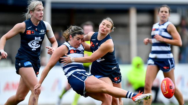 Geelong’s Rachel Kearns is tackled by Mia Austin at Ikon Park on Saturday. Picture: Josh Chadwick/AFL Photos/via Getty Images.