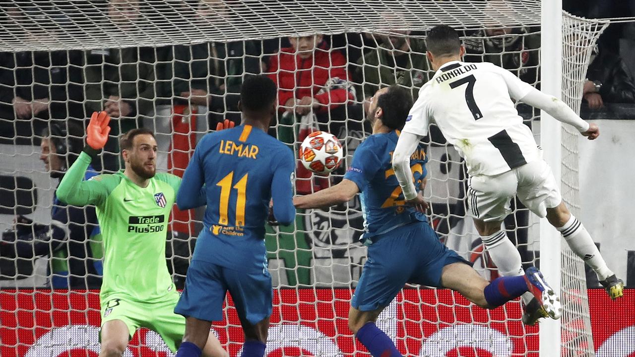 Juventus' Cristiano Ronaldo rises to score the opening goal against Atletico Madrid.