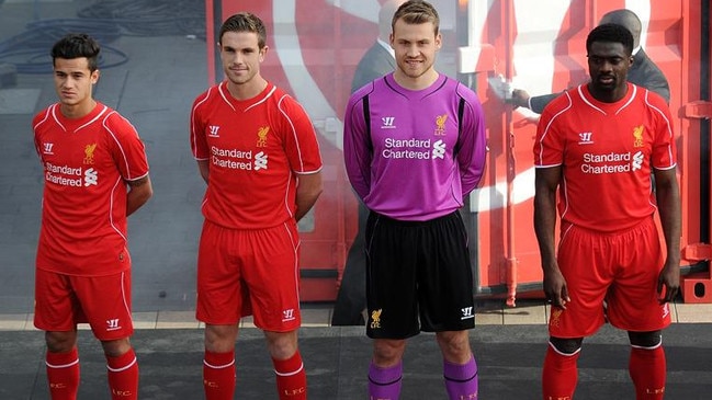 LIVERPOOL, ENGLAND - APRIL 10: (THE SUN OUT, THE SUN ON SUNDAY OUT) Philippe Coutinho, Jordan Henderson, Simon Mignolet and Kolo Toure of Liverpool present the new home kit for next season at Liverpool One on April 10, 2014 in Liverpool, England. (Photo by Andrew Powell/Liverpool FC via Getty Images) *** Local Caption *** Philippe Coutinho;Jordan Henderson;Simon Mignolet;Kolo Toure