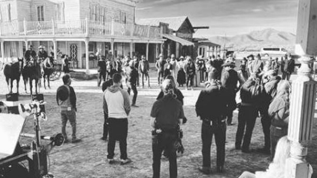 An image taken on the set of Rust shows cast and crew members receiving a safety briefing before filming stunts. Picture: Instagram