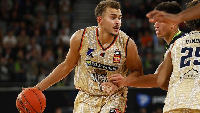 DJ Hogg of the Taipans drives to the basket during the round two NBL match between South East Melbourne Phoenix and Cairns Taipans on October 08, 2022, in Melbourne, Australia. (Photo by Daniel Pockett/Getty Images)