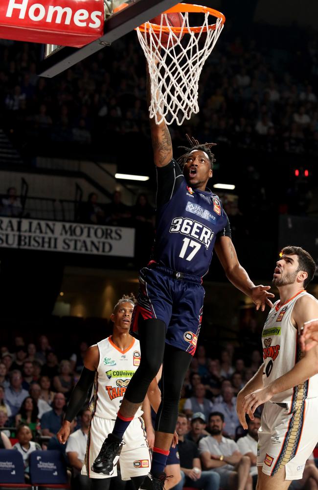 Eric Griffin rises to the basket against Cairns. Picture: Kelly Barnes (AAP).