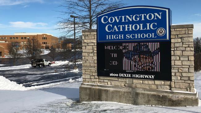 Snow covers the grounds of Covington Catholic High School in Park Hills, Ky., Sunday, Jan. 20, 2019. The school has received national attention in the wake of videos showing students from the school mocking Native Americans outside the Lincoln Memorial after a rally in Washington. (AP Photo/Lisa Cornwell)