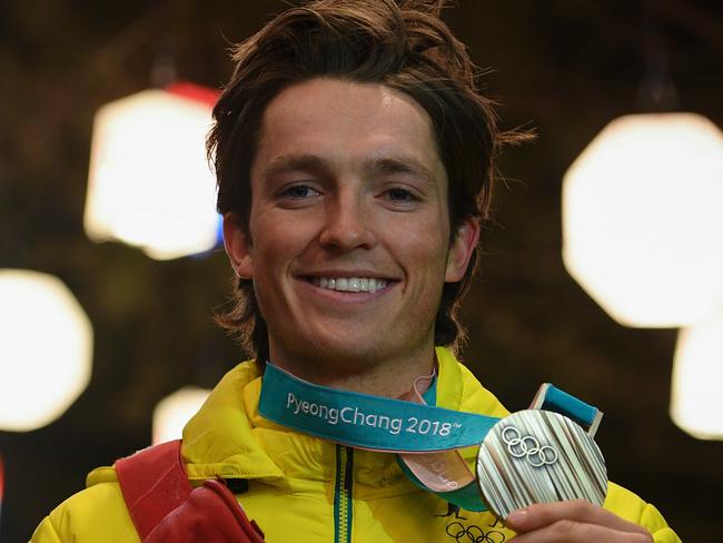 Scotty James of Australia poses for a photograph after receiving the bronze medal in Men's Snowboard Halfpipe at the PyeongChang Olympic Plaza, during the PyeongChang 2018 Winter Olympic Games, in PyeongChang, South Korea, Wednesday, February 14, 2018. (AAP Image/Dan Himbrechts) NO ARCHIVING, EDITORIAL USE ONLY