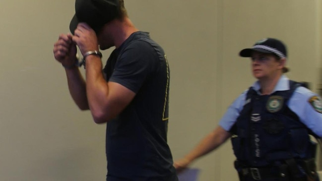 Caine Rootes being taken to Dubbo Police Station after his arrest. Picture: NSW Police