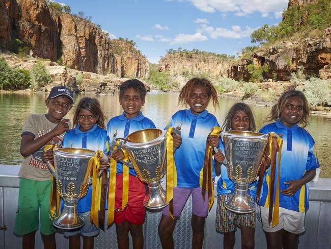 Hawthorn’s premiership cups in Katherine. Picture: Supplied by Hawthorn Football Club