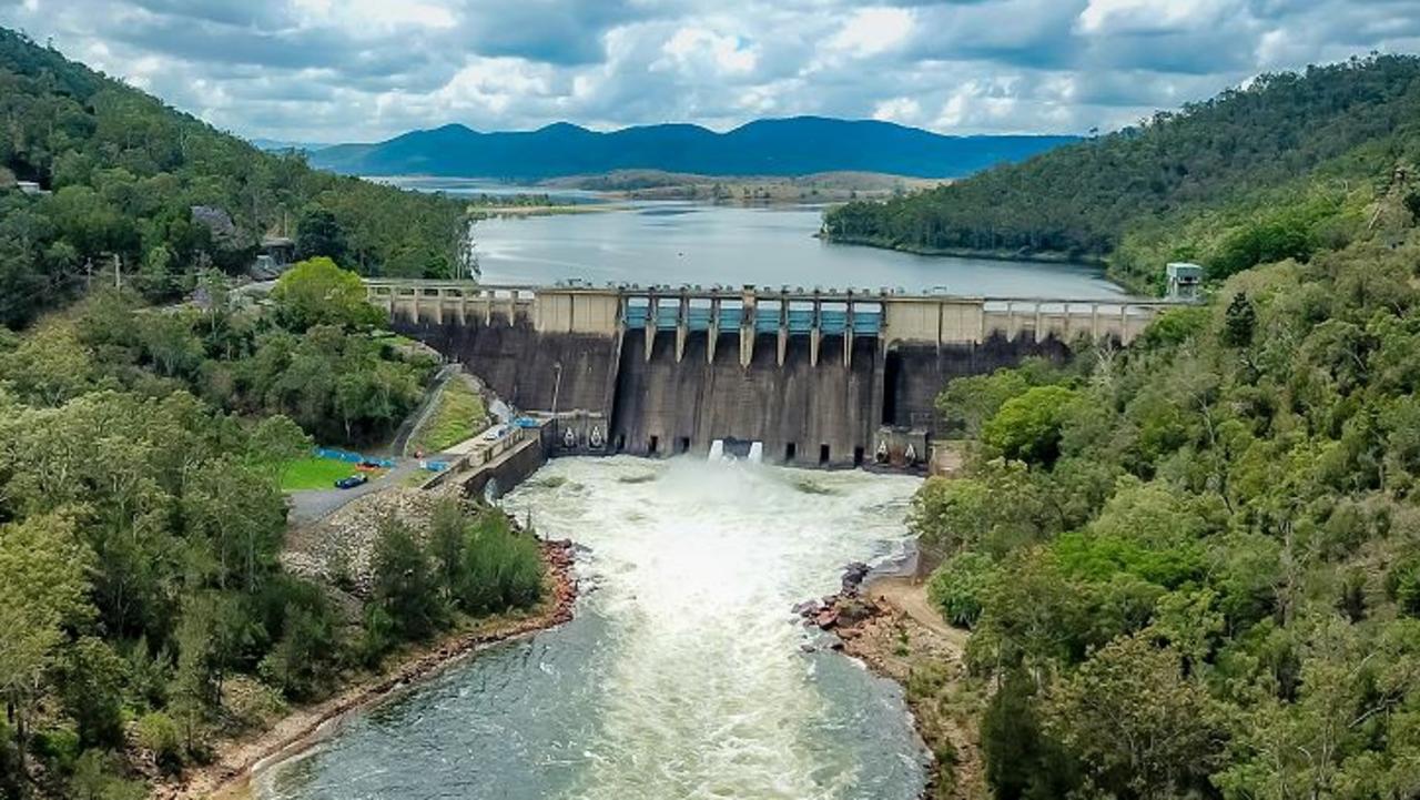 Dams spill for second time in a month as state reels from storm surge