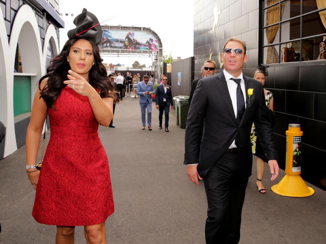 Lydia Schiavello and Shane Warne at the Lavazza marquee on Melbourne Cup Day 2014.