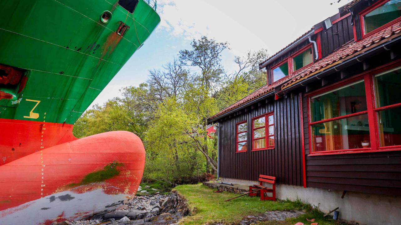 Man wakes to find massive cargo ship on his doorstep